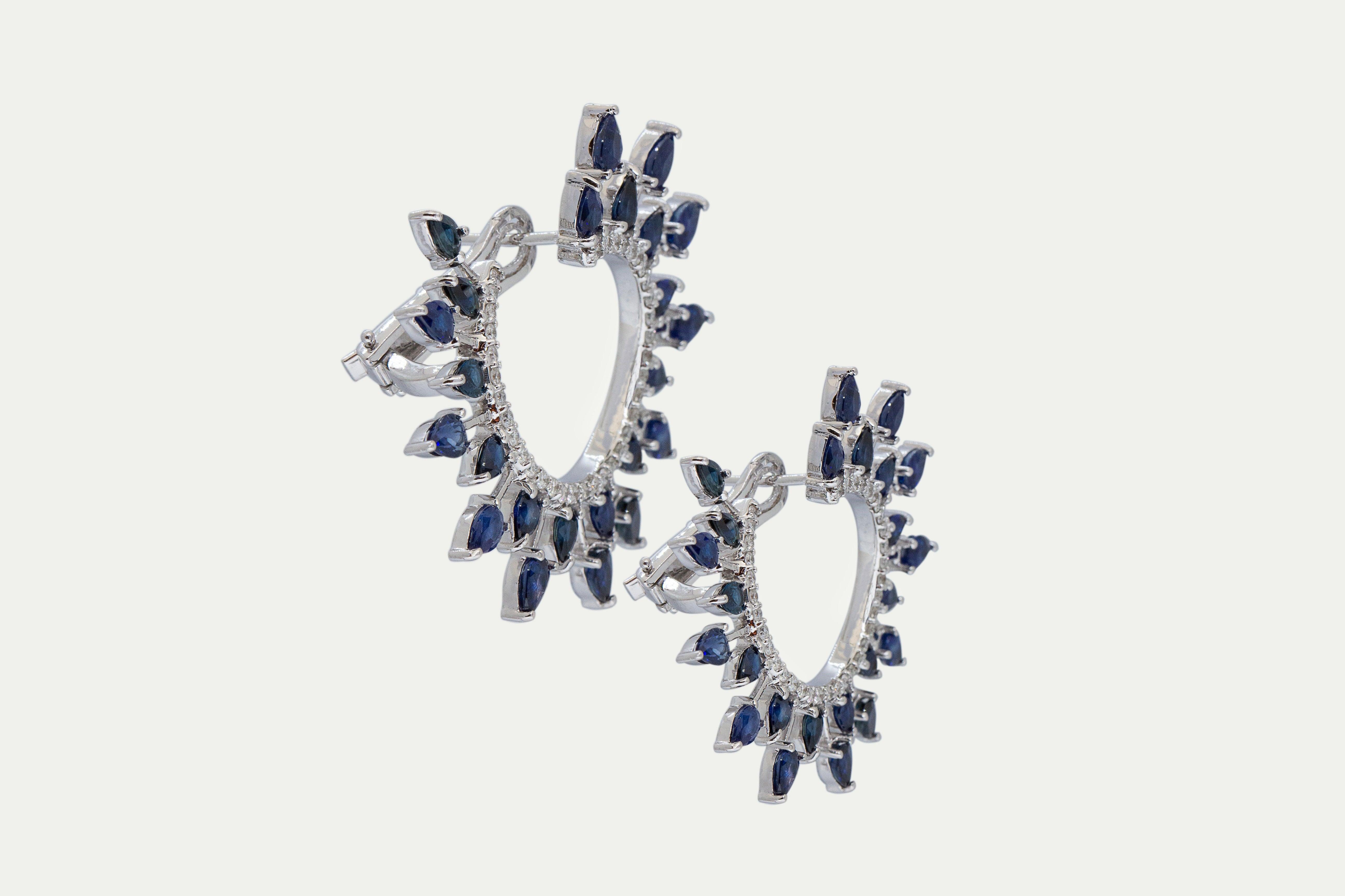 Earrings 18k white gold with 72 round diamonds, Carat total weight 0.96 and 48 blue sapphire stones, Carat total weight 10.36