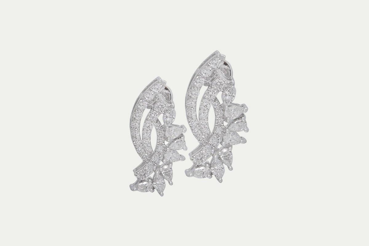 Earrings 18k white gold with 44 round diamonds, Carat total weight 0.91, 4 Marquise stones, Carat total weight 0.28 and 10 pear stones, Carat total weight 0.64